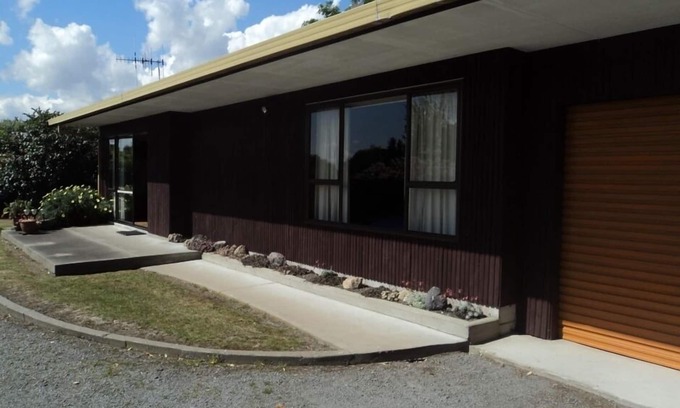 Two Mile Bay House | Family-Friendly Two Bedroom Bach with Lake View & Pool