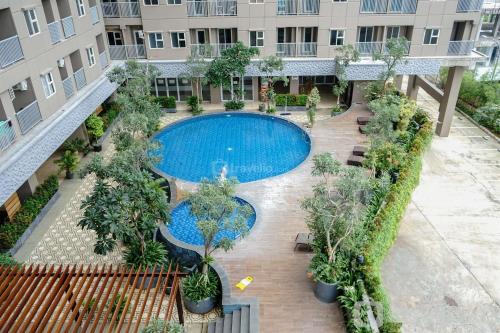 Ciputat Apartment | Cozy Studio Retreat at Baileys Apartment by Travelio