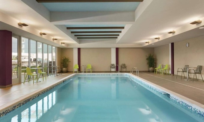 Williamsville Hotel | Comfort Retreat: Poolside Relaxation & Free Breakfast Awaits