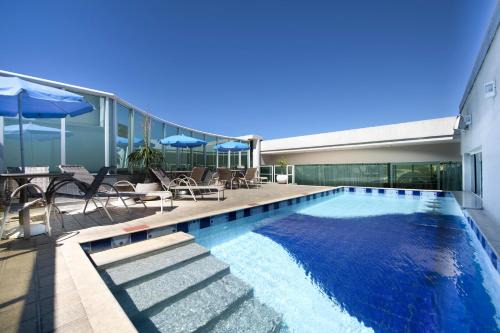 Cavaleiros Hotel | Pet-Friendly Comfort Suites Macaé with Oceanfront Views