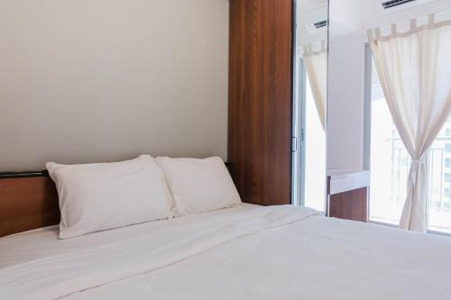 Tangerang Apartment | Inviting 2BR Apartment in Serpong with Pool Access