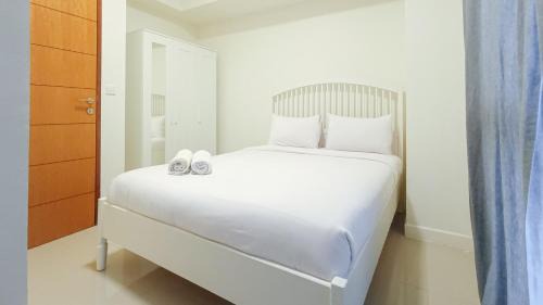 Makassar Apartment | Cozy 2BR Retreat at Vida View Apartment by Travelio