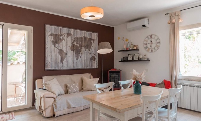 Budoni Apartment | Cozy Apartment with Ocean Views in the City Center