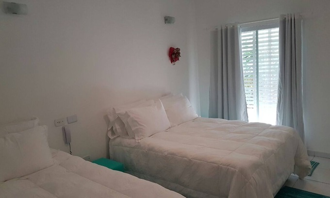 Enseada Hotel | Beachfront Delphin Hotel Suite with Pool and Family Fun