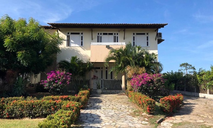 Aruanda House | Cozy Retreat with Ocean View & Pet-Friendly Amenities