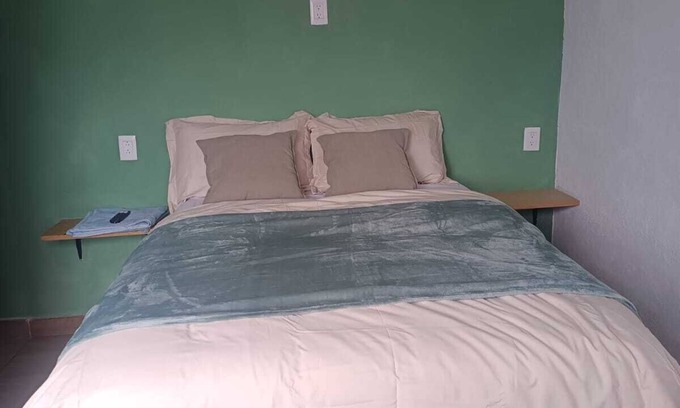 Queretaro Apartment | Comfortable room with private bathroom next to plaza candiles in Querétaro