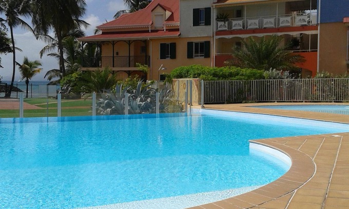 Bas du Fort Apartment | Inviting T3 with Pool, Beach Access & 10/10 Guest Rating