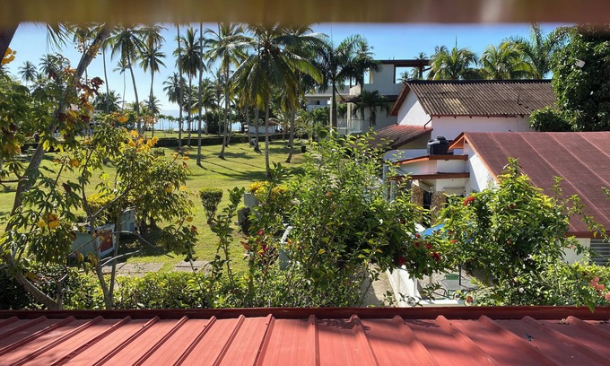 Puerto Bahia Villa | Comfortable townhouse with garden and porch, in beautiful beach urbanization.