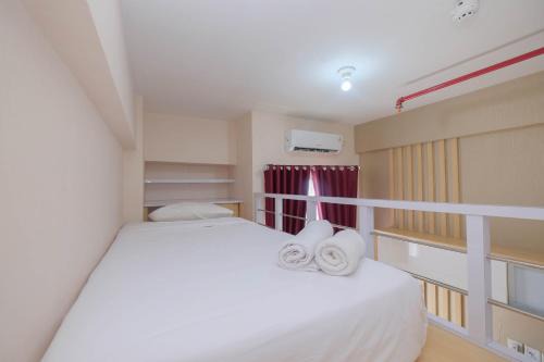 Depok Apartment | Cozy Studio Retreat at Dave Apartment By Travelio