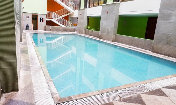 Siwalankerto Apartment | Cozy Studio at High Point Serviced Apartment with Pool