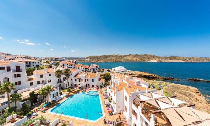 Platges de Fornells Apartment | Oceanfront Comitas Tramontana Park with Pool and Dining