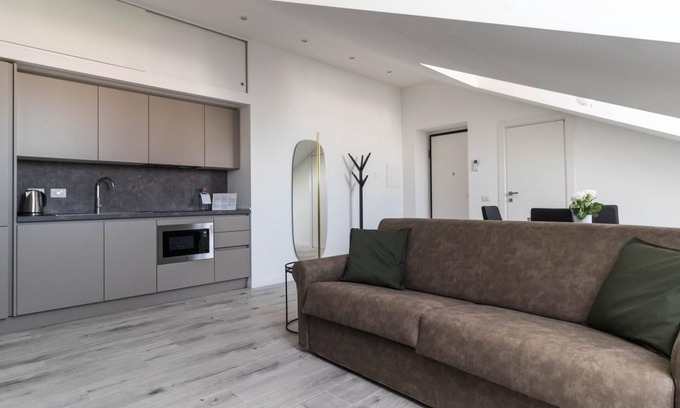 Guastalla Apartment | Discover Comfort at Commenda 35 C: Family-Friendly Stay