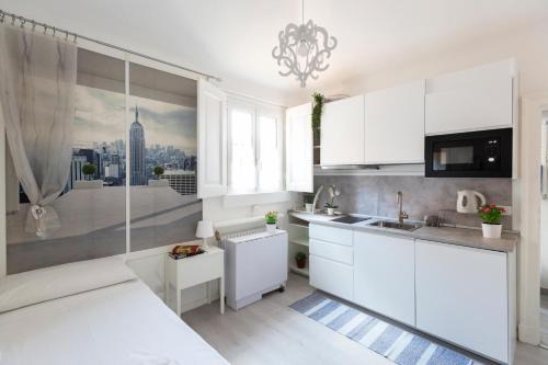 Guastalla Apartment | Budget-Friendly Commenda White Studio with Breakfast Included