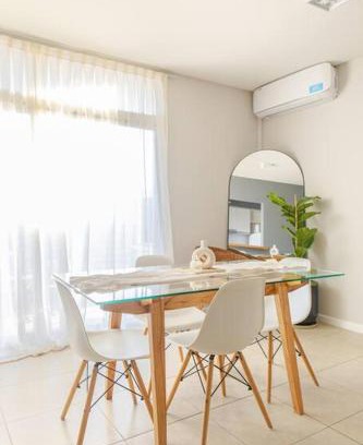 Junin Apartment | Stylish Comfort at Premium Tower in Junín with Ocean View