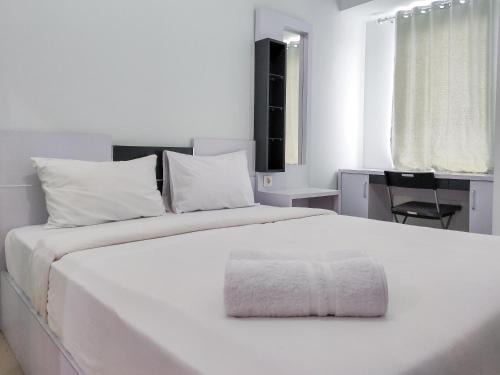 Karawang Apartment | Cozy Tamansari Mahogany Studio Apartment with Pool Access