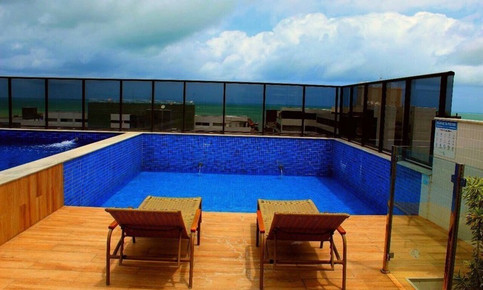 Tambau Apartment | Cozy Retreat at Compact Flat Tambau with Pool & Breakfast