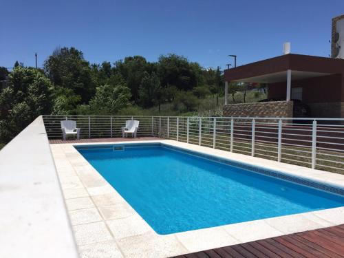 Villa Carlos Paz Cabin | Tranquil Cabañas Coquena: Family-Friendly with Pool Access