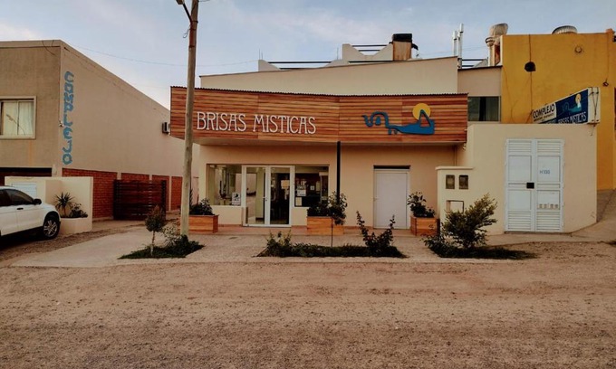 Las Grutas Hotel | Experience Complejo Brisas Místicas with Ocean Views
