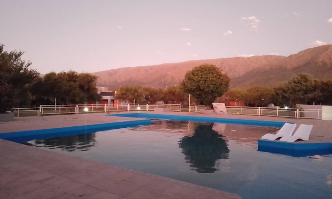 Cortaderas Apartment | Relax at Complejo El Peregrino: Pool, Spa & Family-Friendly