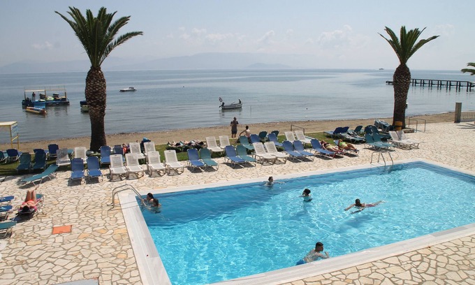 Kavos Hotel | Sunny Stays at Complex Lemon Grove: Pool & Ocean Views