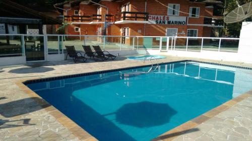 Praia da Enseada Apartment | Ocean View Cond Apartamentos Chalés San Marino - 9/10 Rated