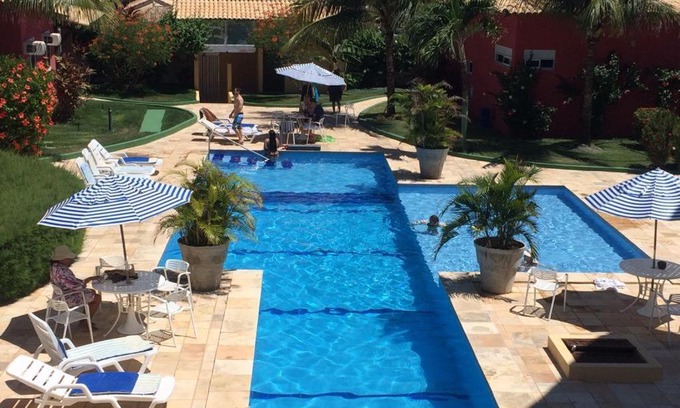 Nisia Floresta Apartment | Relaxing Condomínio Arituba Tropical with Ocean Views & Pool