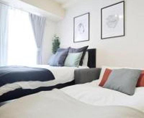 Nishi Apartment | Family-Friendly Getaway at コンフィデンスロン405