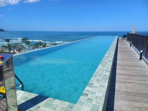 Praia Grande Apartment | Relax and Enjoy Style Near the Sea with Hot Tub Amenities