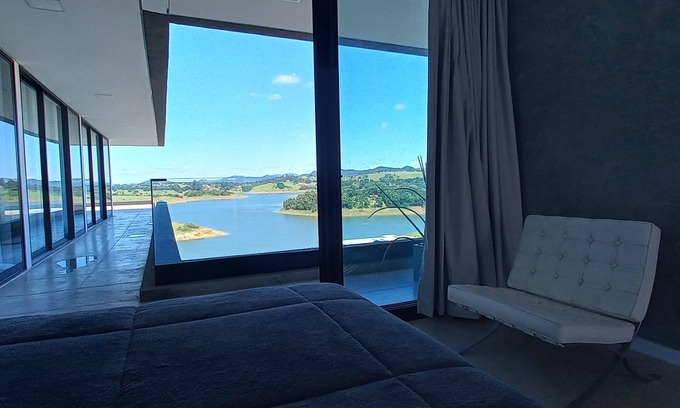 Joanopolis House | Modern Retreat in Gated Community with Scenic Dam Views