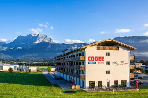 Sankt Johann in Tirol Hotel | Discover COOEE alpin Hotel: Spa & Hot Tub Retreat