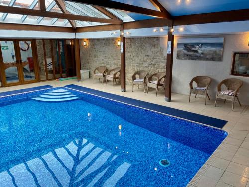 Uplyme House | Experience Coombehayes Barn: A 4-Star Gem with Pool Access