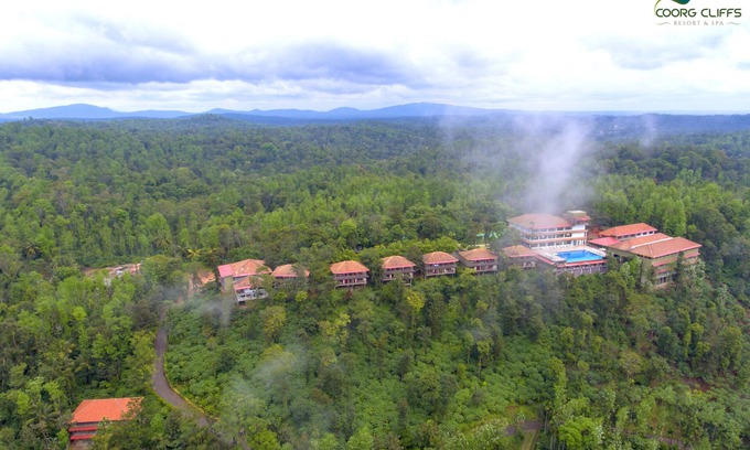 Polibetta Hotel | Inviting Coorg Cliffs Resort: Pool, Dining & Family Fun