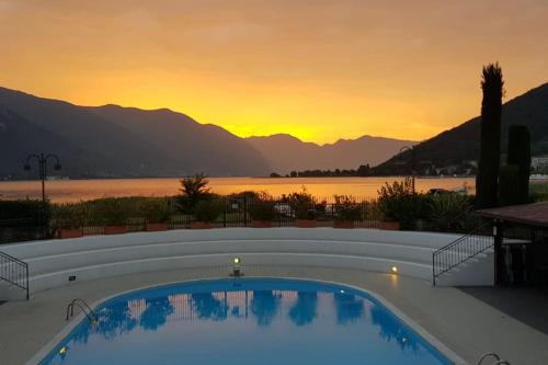 Paratico Apartment | Elegant Copelia: Family-Friendly Pool Retreat with High Ratings