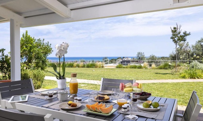 Defensola Apartment | Beachfront Bliss at Coppa Carrubo Residenza - 4 Star Retreat