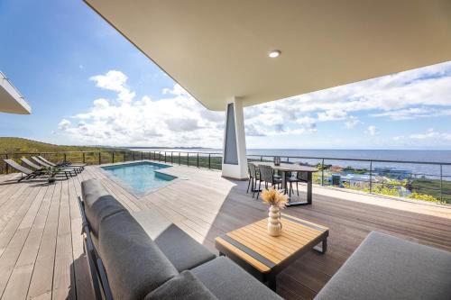 St. Marie Villa | Elegant Coral Estate Holidays with Private Beach & Spa