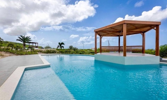 St. Marie Apartment | Oceanfront Bliss at Coral Estate Resort - 9/10 Guest Rated