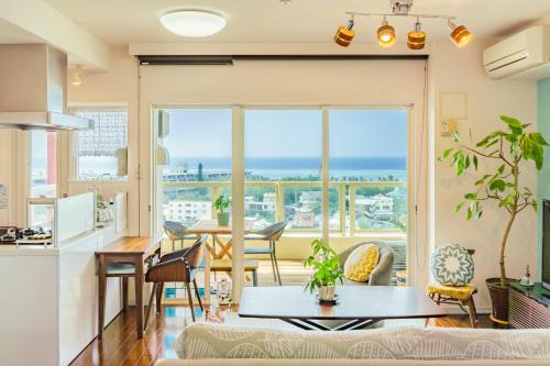 Maeganeku Apartment | Oceanfront Escape at Fululu Okinawa - Rated 8.9/10!