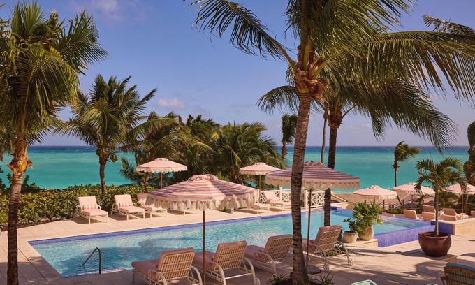 Dunmore Town Hotel | Coral Sands Hotel: Family-Friendly Retreat with Pool Access