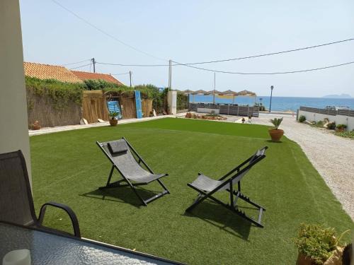 Kokinos Pirgos Apartment | Oceanfront Coral Sea Apartment - Rated 9/10 by Guests