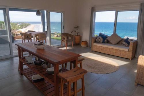 Tofinho Apartment | Oceanfront Coral Tree Surf Cottage - Rated 9.7/10!