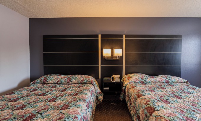 Hastings Hotel | Family-Friendly Coratel Inn with Kitchen & 2 Queen Beds