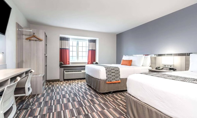 Rochester House | Comfortable Coratel Inn & Suites with Great Amenities