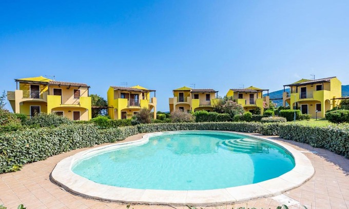 Viddalba Apartment | Corbezzolo: Pet-Friendly Retreat with Pool & Family Perks