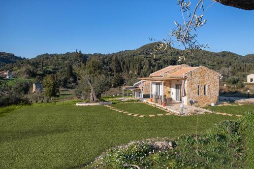 Kavvadades House | Exceptional Ktima Arillas - Family-Friendly Retreat