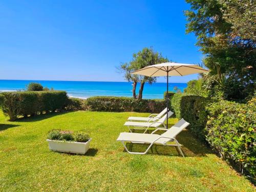 Glyfada House | Glyfada Beachfront House: Family-Friendly Oasis by the Sea