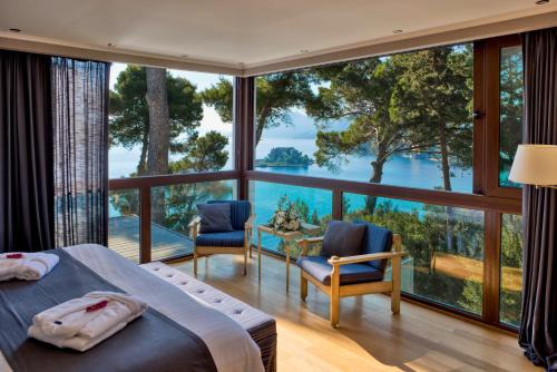 Kanoni Hotel | Oceanfront Serenity at Corfu Holiday Palace - 5-Star Escape