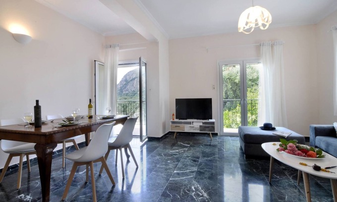 Doukades Apartment | Relaxed Vacations Await at Corfu with Family-Friendly Amenities