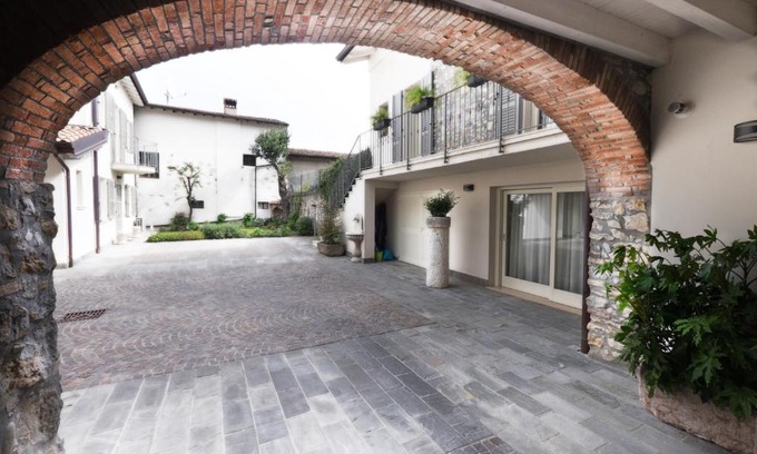 Manerba del Garda Apartment | Experience Oceanfront Comfort at Corte Elvira Hotel