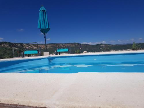 Iznajar House | Exceptional Oceanfront Getaway at Cortijo de la Cruz
