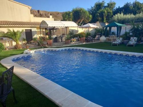 Arboleas Bed & Breakfast | Cozy Cortijo Esquina B&B with Oceanfront Pool & Dining